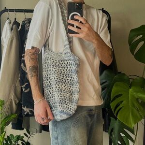 Baby blue and white knitted tote bag with a beachy vibe. Perfect condition.